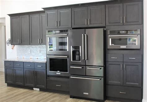 black kitchen cabinets with stainless steel inserts|black stainless steel kitchen cabinets.